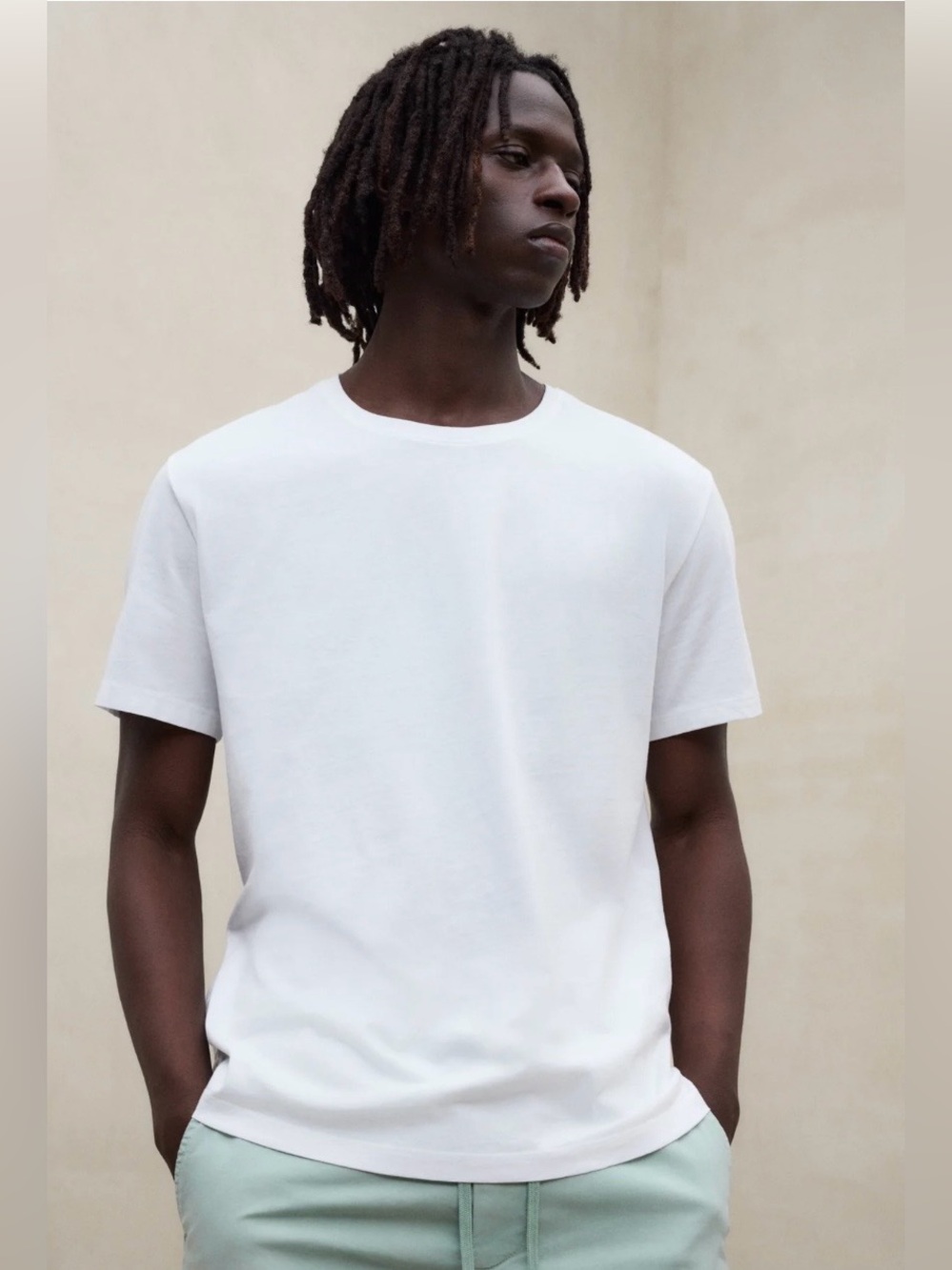Uniqlo Men's White Short-Sleeve Crewneck Tee, 100% cotton.